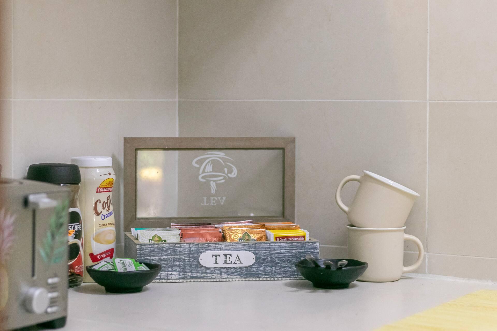 The shared kitchenette with tea, coffee and drinking water