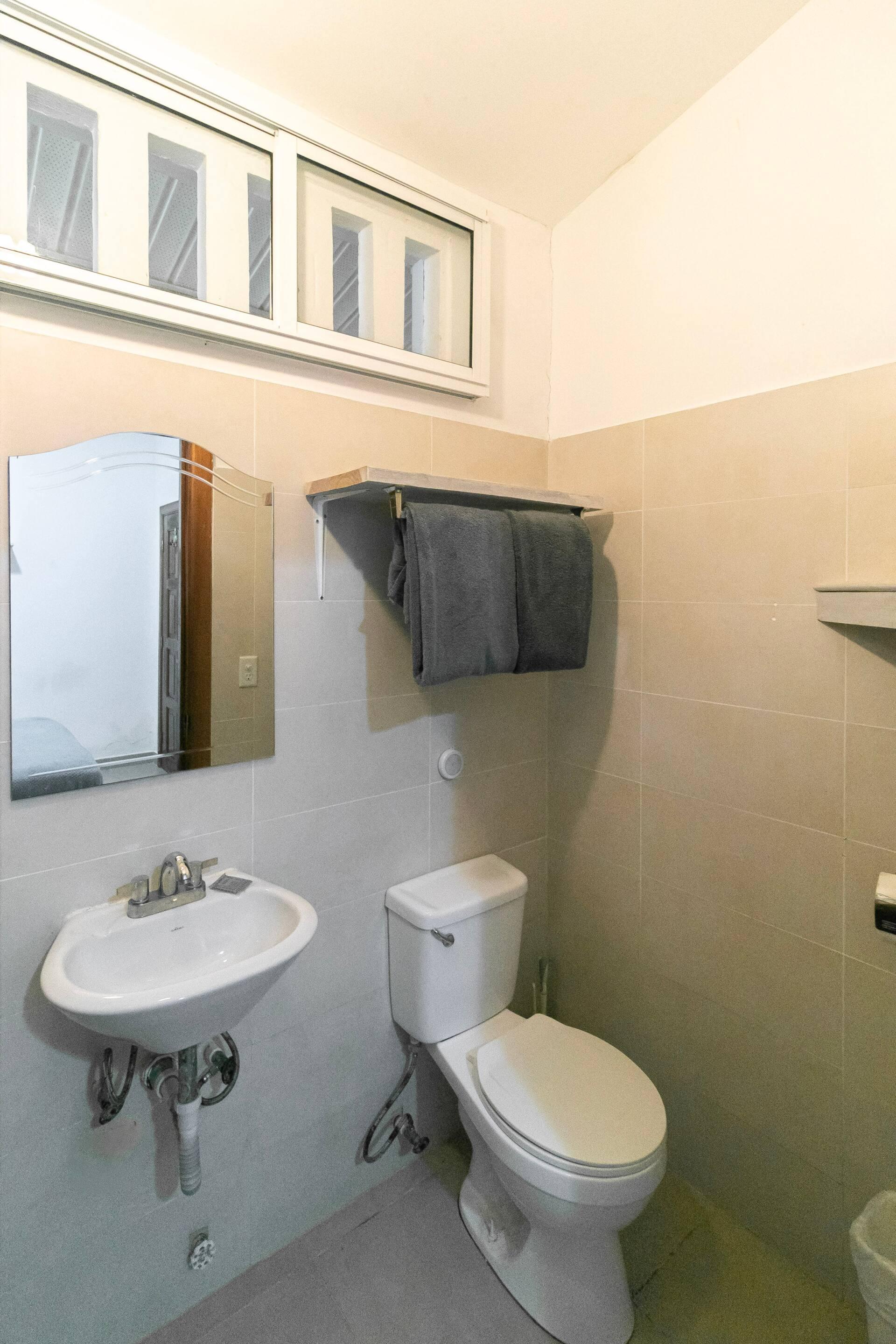A private en suite bathroom with a walk in shower